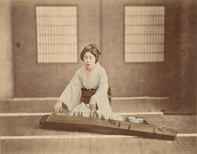 Japanese Woman Playing a Koto by Unknown artist