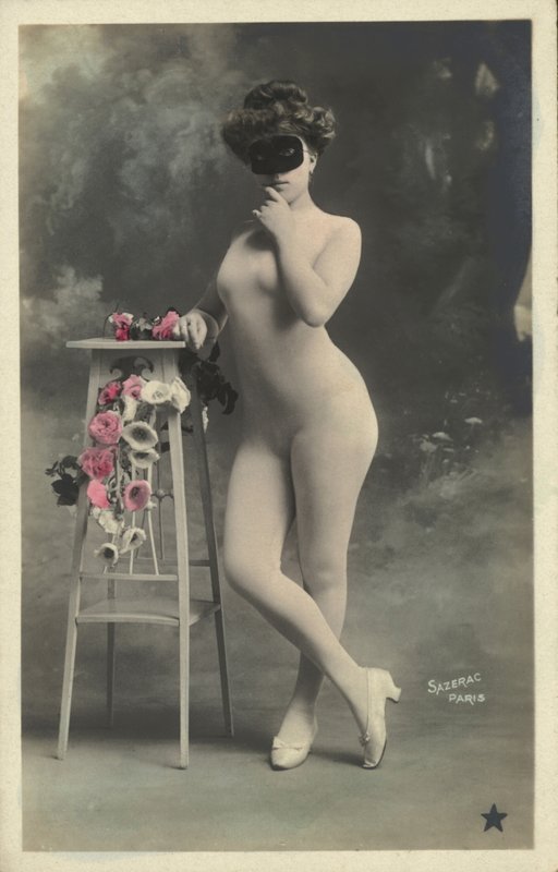 Girl in a mask by French Photographer