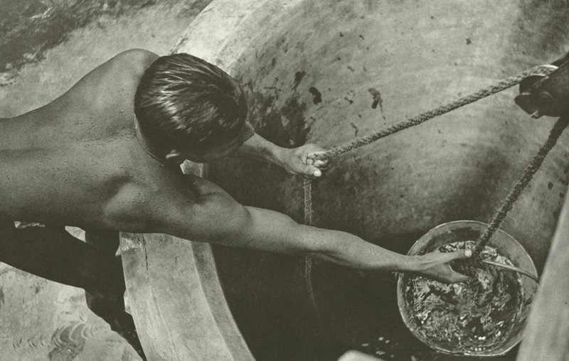 At the well by Lionel Wendt